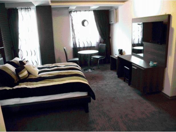 Duvet Center Hotel Skopje Quarto foto