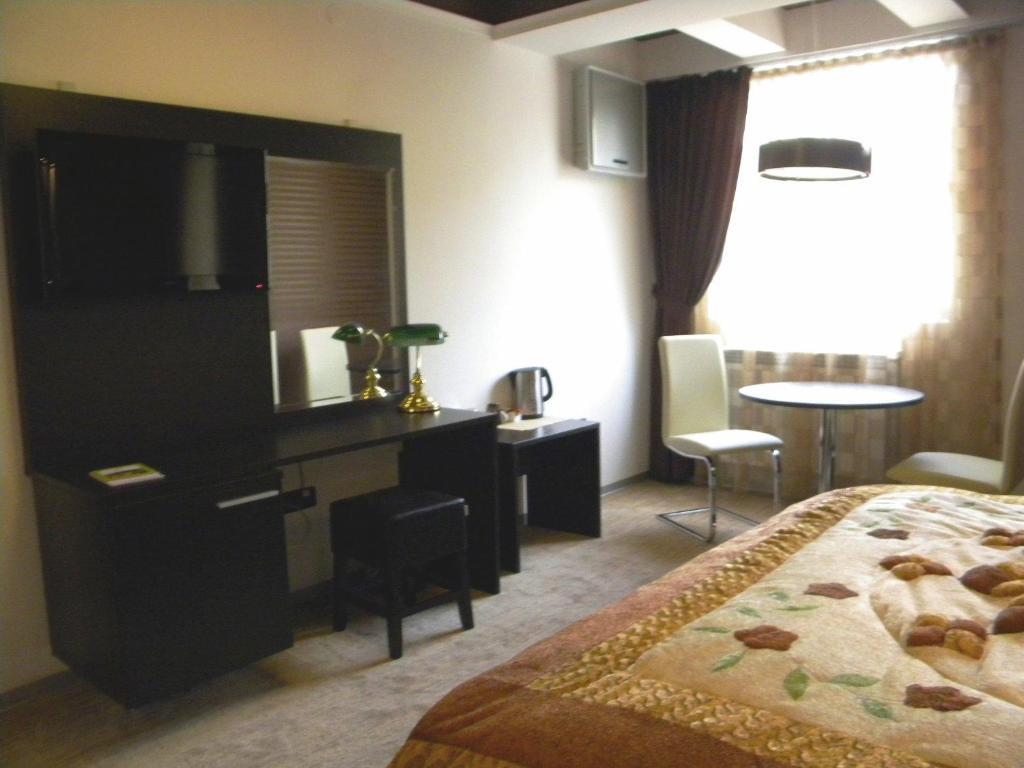 Duvet Center Hotel Skopje Quarto foto