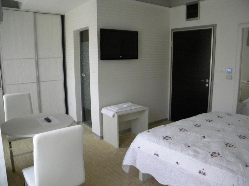 Duvet Center Hotel Skopje Quarto foto
